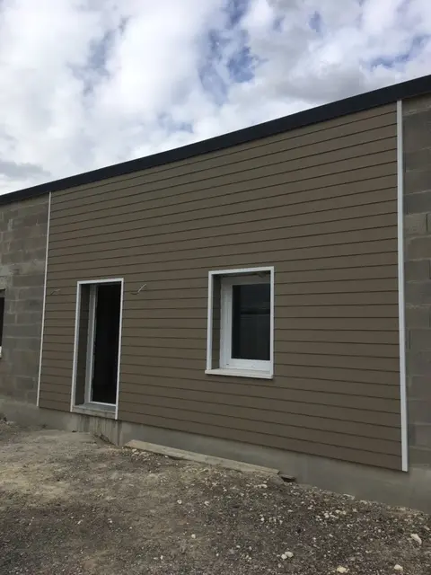 Réalisation de bardage extérieur par Dtoits86, entreprise de couverture à Poitiers